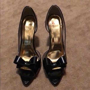 Patent black bow heels. Only worn twice. 4in. heel